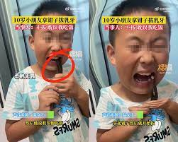 Cậu bé nhổ răng sữa bằng cách khiến ai cũng rùng mình